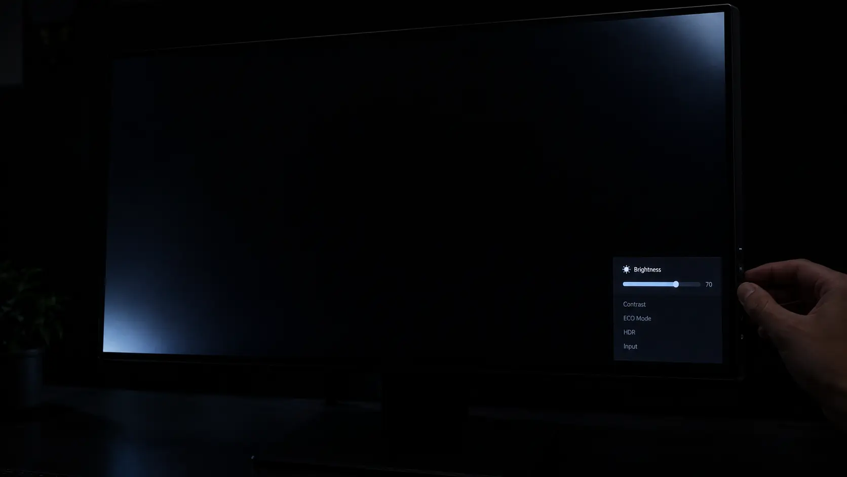 Testing a monitor for backlight bleed with a full black screen in a dark room